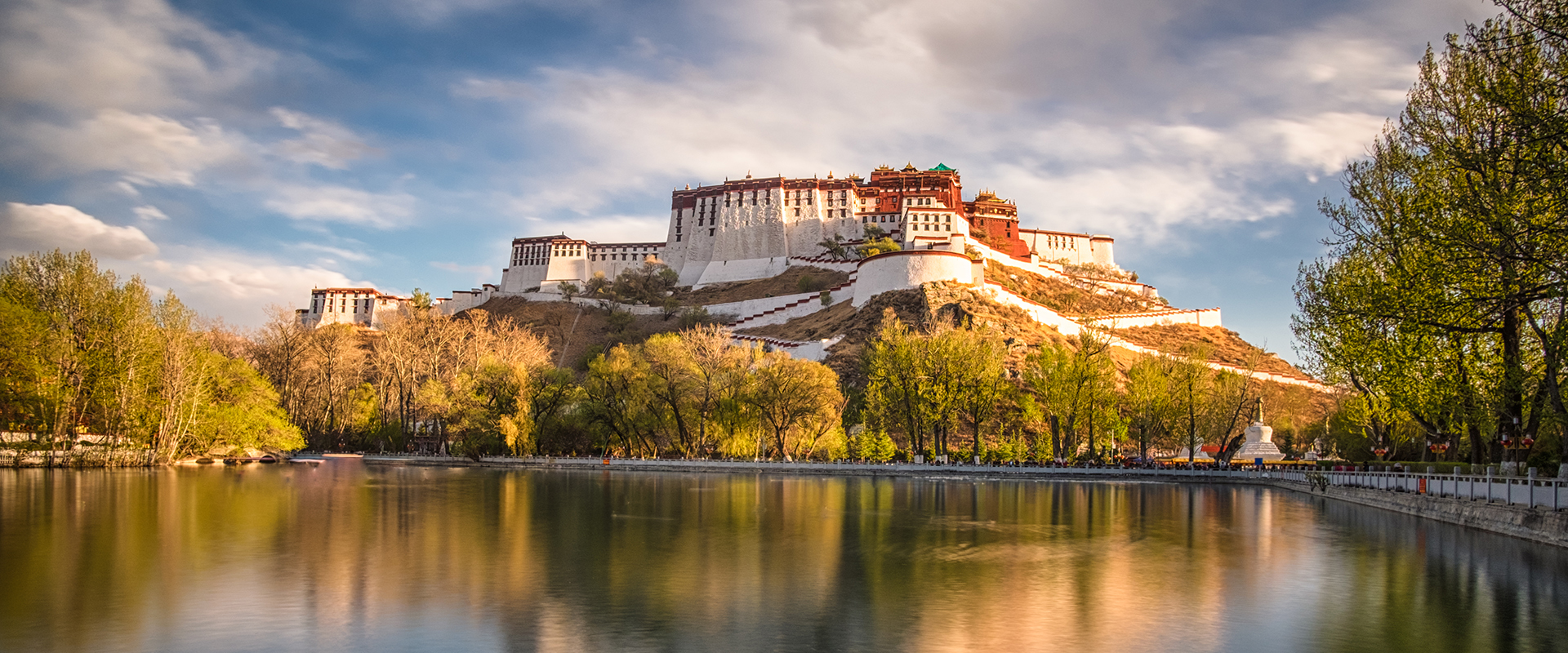 Snow-covered Himalayan mountains and monastery in Tibet